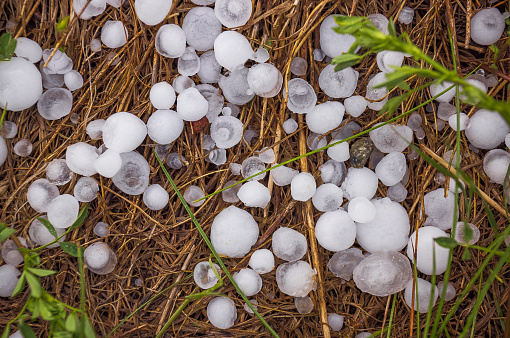 Background of hailstones on the ground, a lot of hailstones, climate change concept