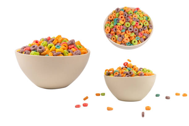 istock Colorful rings cereal spill out into a bowl. Breakfast. Isolated. 1403082785