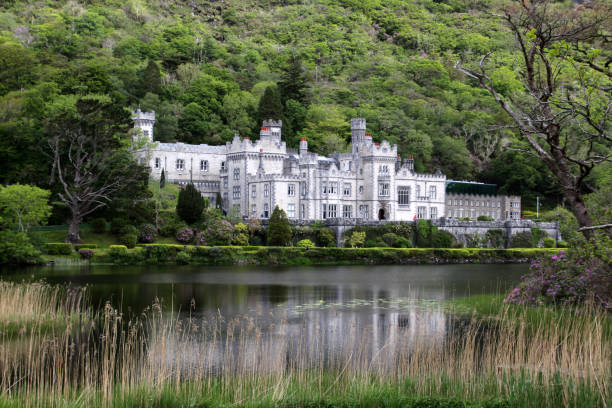 Kylemore Abbey on Pollacapall Lough in Connemara in County Galway, Ireland County Galway, Ireland:-Kylemore Abbey is the oldest British Benedictine Abbey in Connemara, County Galway. kylemore abbey stock pictures, royalty-free photos & images