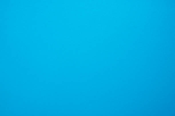 istock Paper, cardboard background. High resolution paper texture. Colored Blue background. 1403094780