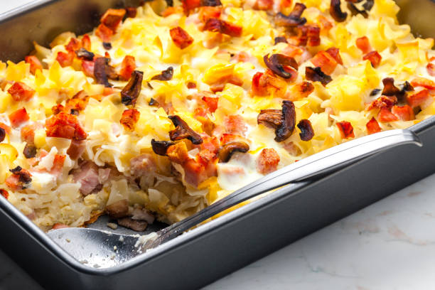 istock baked pasta with smoked meat and eggs 1403095083