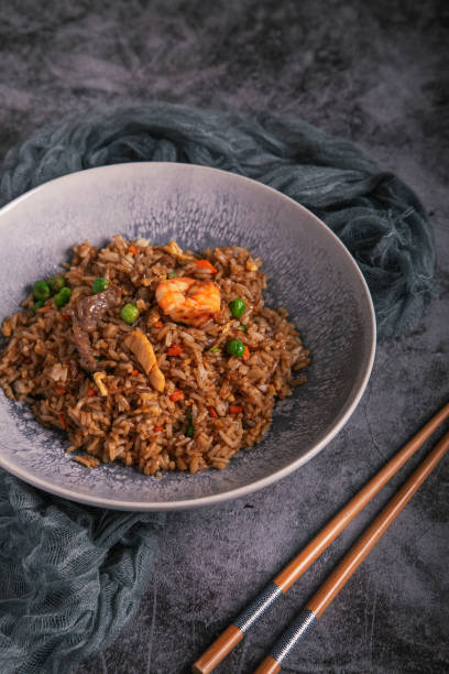 istock chaulafan shrimp rice. Wok rice mixed with vegetables and shrimp 1403095738