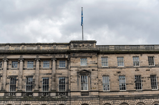 The facade of a building in the Scottish capital on a cloudy day.