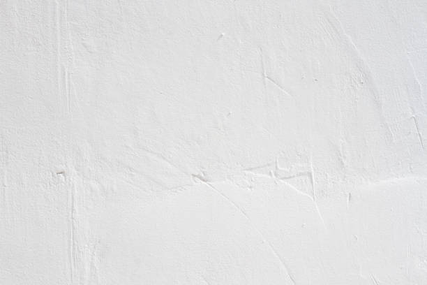 istock The texture of the stone wall.Small cracks on the concrete wall. 1403100410