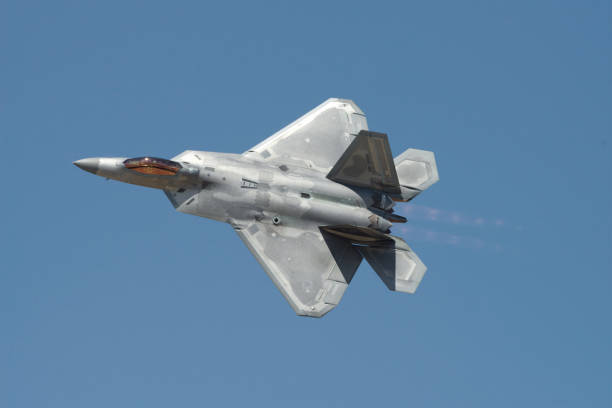 Lockheed Martin F-22 Raptor Lancaster, California, USA - March 24, 2018: image of Lockheed Martin F-22 Raptor with registration 07-4131 or AF07-131 shown during a low pass. supersonic airplane editorial airplane air vehicle stock pictures, royalty-free photos & images