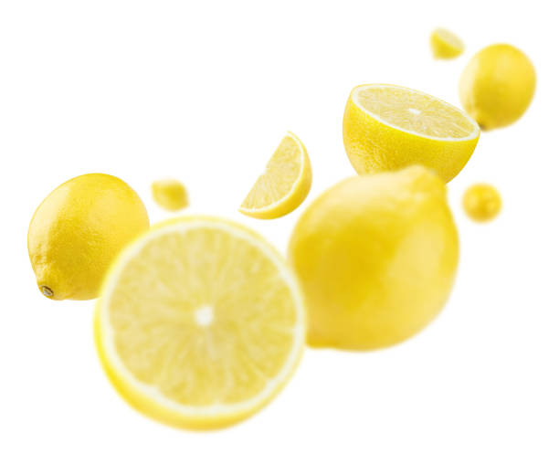 istock Flying lemon fruits on white 1403102479