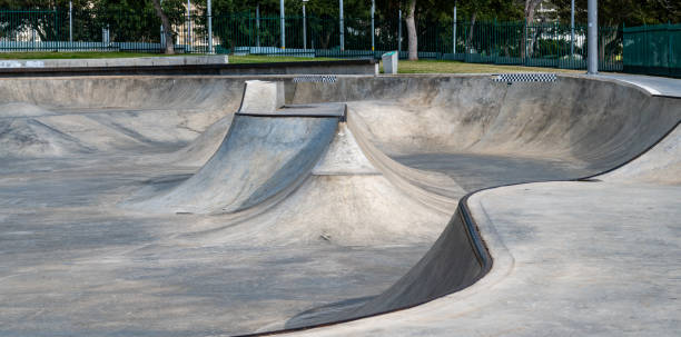 istock Public playground for a skateboard in a recreation park. 1403103930