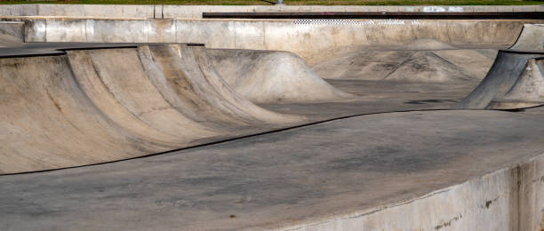 istock Public playground for a skateboard in a recreation park. 1403103933