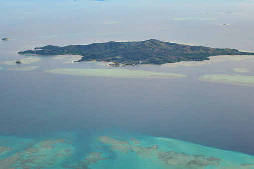 Malolo  island, Mamanuca archipelago, Fiji: seen from the air, volcanic island, he largest of the Mamanuca Islands and home to two villages.
