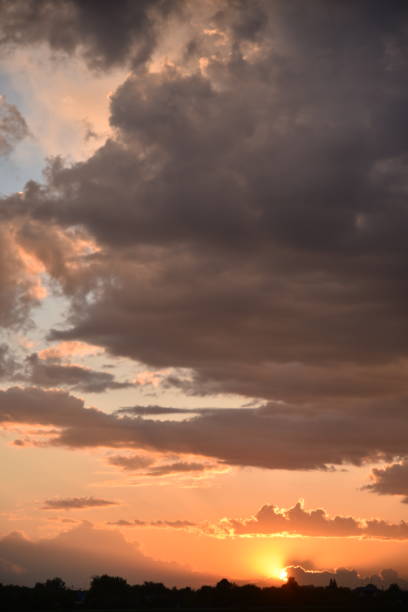 istock Beautiful golden evening sunset with pink clouds 1403107828
