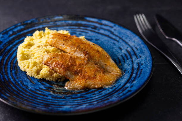 istock spicy fillet of white cod with couscous 1403112449