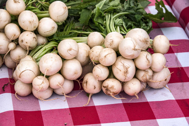Baby Turnips on Display at a Farmers Market stock photo