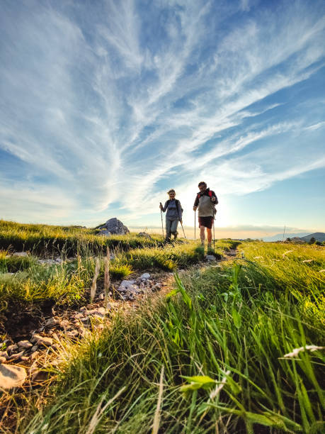 istock Two Seniors Hiking and Walking Off The Beaten Path 1403117672