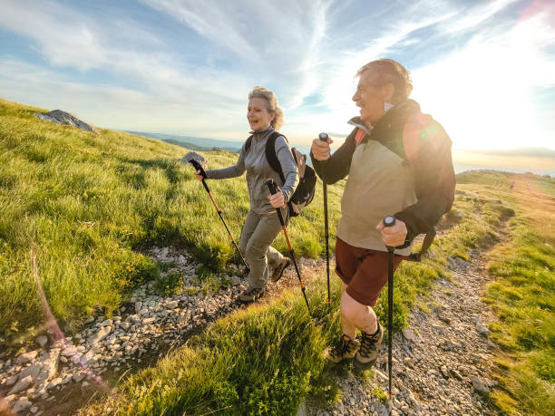 istock Two Seniors Hiking and Walking Off The Beaten Path 1403117728
