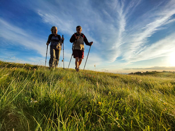 istock Two Seniors Hiking and Walking Off The Beaten Path 1403117732