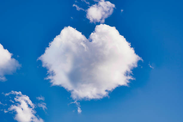 istock A White heart from the cloud in the blue sky 1403119145
