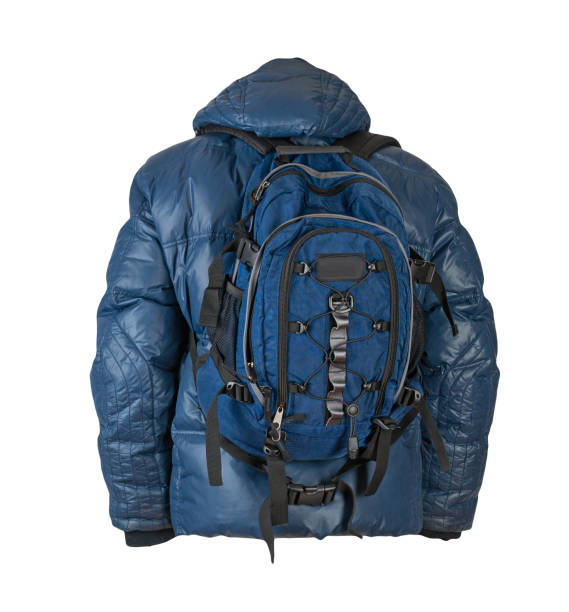 istock black backpack dressed in a red jacket isolated on a white background. 1403122766