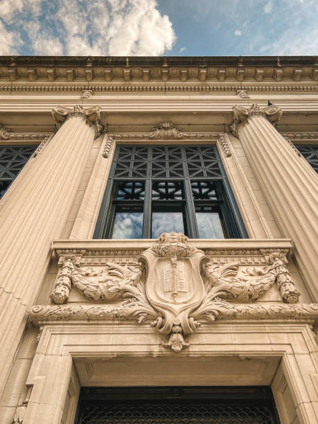 istock Looking up at Ornate Classical Style Stone Architectural Details at the Illinois Supreme Courthouse. 1403127831