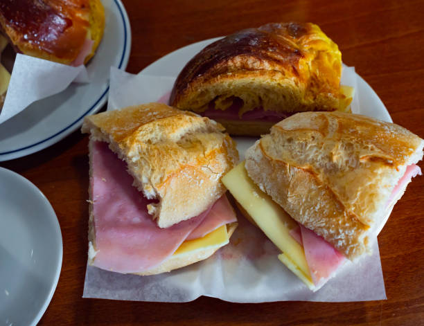 istock Delicious sandwiches with ham and cheese 1403128687