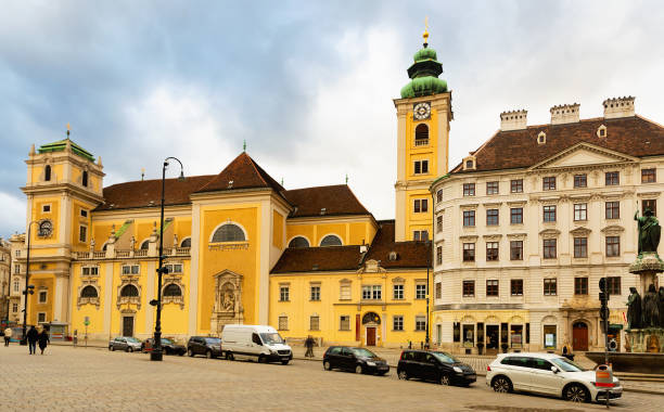 istock Vienna central square with Schottenkirche church and Benedictine Abbey 1403128706