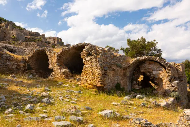 Photo of Remains of ancient necropolis on hillside in Turkish city of Anemurium