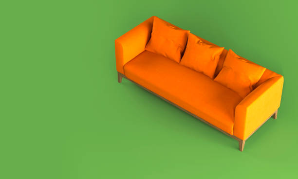 モダンなスカンジナビアの明るいオレンジ色のファブリックソファと木製の脚に柔らかい枕、緑の背景に平らなレイビューの上から眺めます。家具、インテリアオブジェクトの単一の部分。� - vehicle interior green sofa indoors ストックフォトと画像