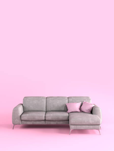 istock Modern fabric gray sofa on metal legs with pink pillows on a pink background flat lay front view. Furniture, single piece of interior object. Stylish trendy couch 1403128790