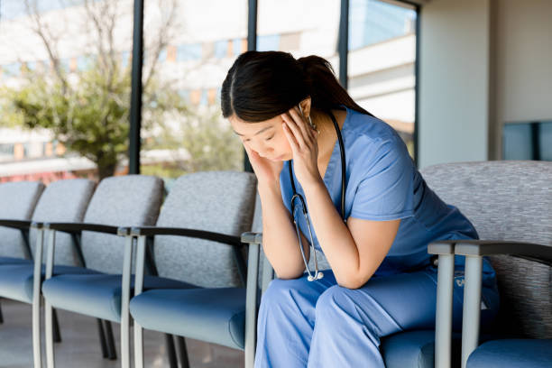 istock Exhausted doctor sits in waiting room 1403133161