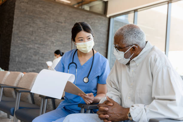 istock Doctor reads through medical chart 1403133184
