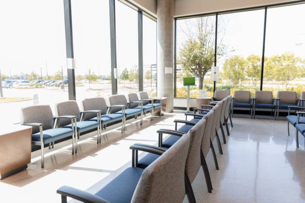 istock Large, empty hospital waiting room 1403133437