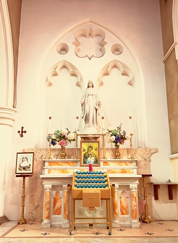 Altar with candlesticks in a Catholic church