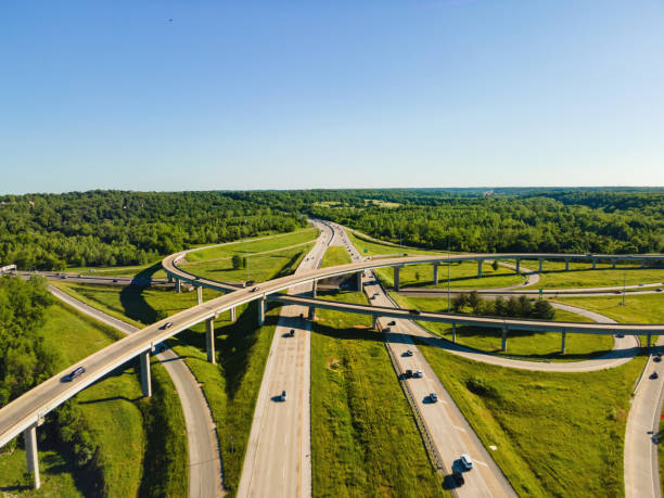 Aerial Flyover Overpass Traffic View in Midwest USA Highway Transportation Photo Series Rush Hour Suburban Highway Traffic Aerial Flyover Overpass Traffic View in Midwest USA Highway Transportation Infrastructure Springfield Missouri Photo Series Matching Video Available city zoom out stock pictures, royalty-free photos & images