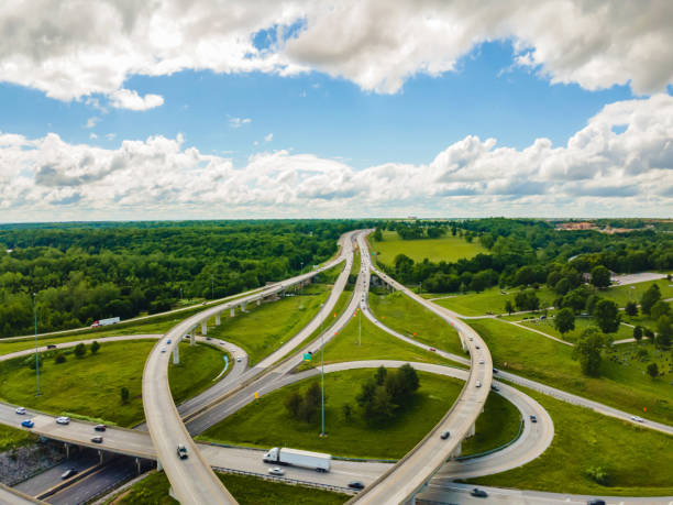 Aerial Flyover Overpass Traffic View in Midwest USA Highway Transportation Photo Series Rush Hour Suburban Highway Traffic Aerial Flyover Overpass Traffic View in Midwest USA Highway Transportation Infrastructure Springfield Missouri Photo Series Matching Video Available city zoom out stock pictures, royalty-free photos & images