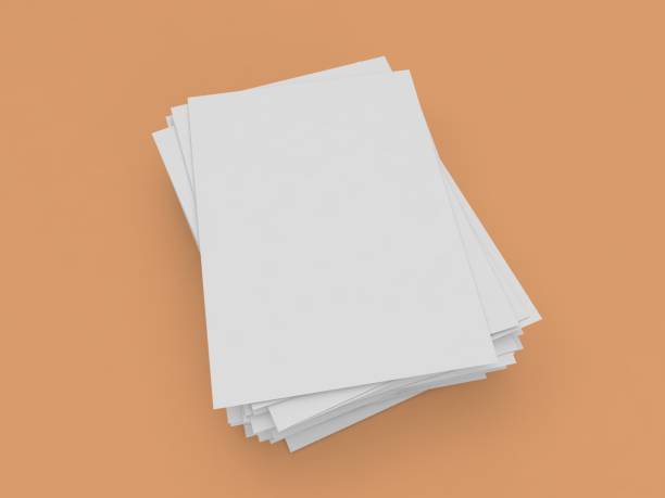istock A stack of white A4 paper on a brown background. 1403139088