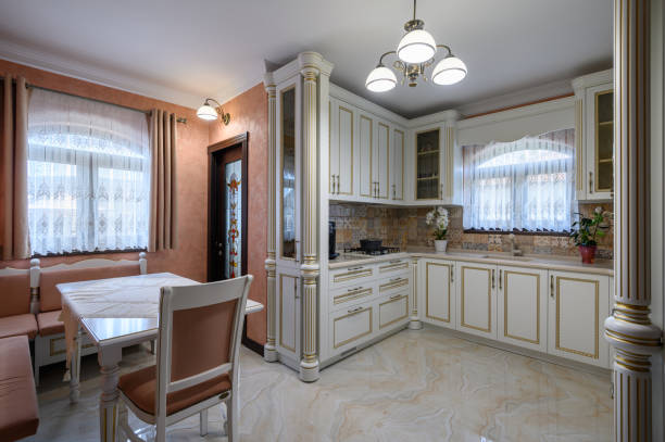 istock White classic cozy kitchen and dining room in city house 1403140420