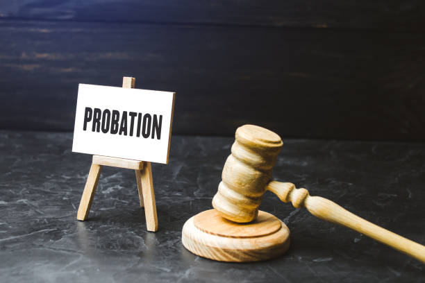istock Probation and judge's gavel. Consideration of an application for early release from imprisonment. Protection of workers rights. Test period. Performance and efficiency testing. 1403145255