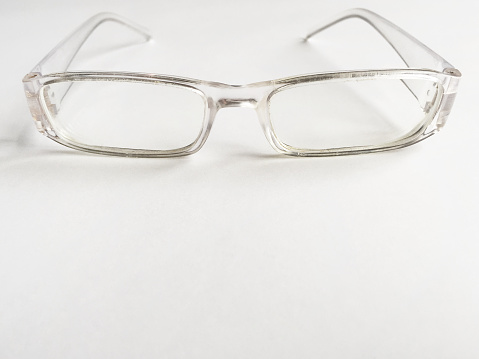 Transparent eyeglasses on the white background