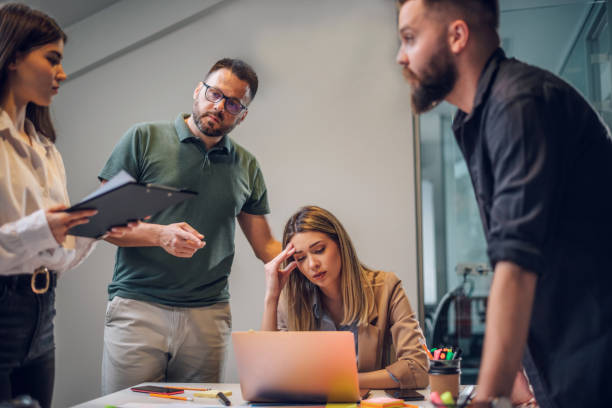 istock Stressed business colleagues having a meeting in an office and solving problems 1403149398