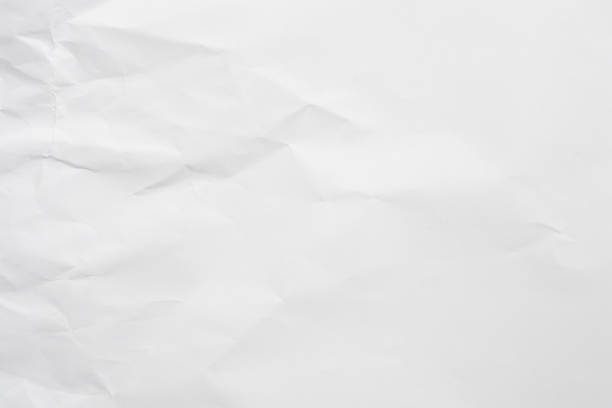 istock White crumpled and creased paper texture background 1403154997