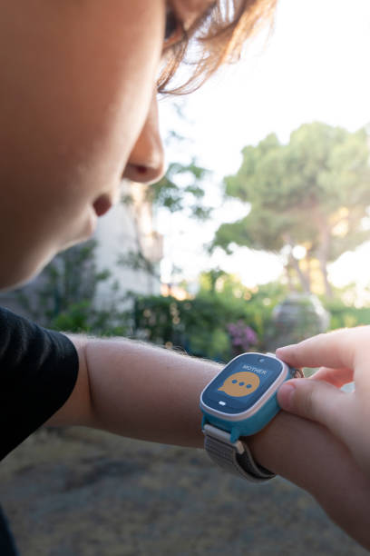 istock Boy calling his mother on his smart watch. 1403155688