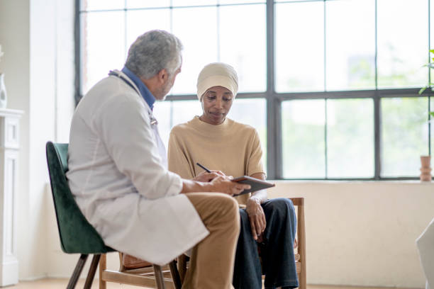 istock Oncologist Discussing Treatment with a Patient 1403159330