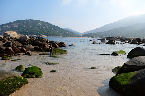 Rocks at the idyllic Yung Shue Ha beach, Lamma Island, Hong Kong.