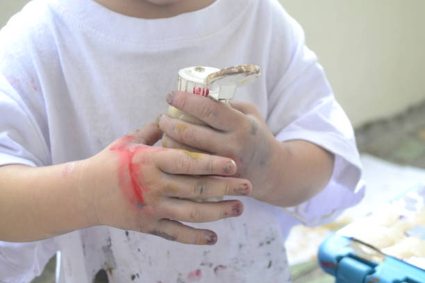 istock Girl painting 1403172411