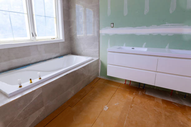 istock Bathroom with marble sink and shower curtain. 1403172608