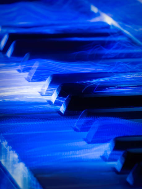 Light painting on a piano keyboard.