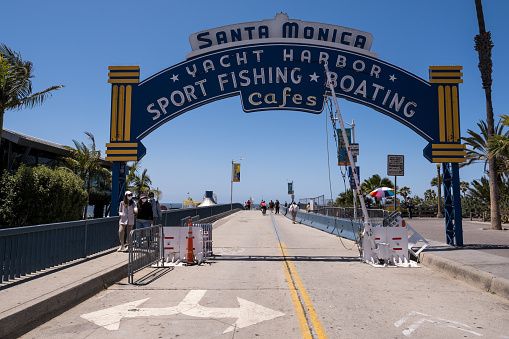 Los Angeles, USA - May 9th, 2022: The iconic Santa Monica Pier late in the day.