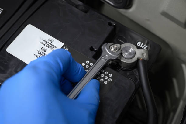 istock Tightening Terminal Clamp on Car Battery 1403180534