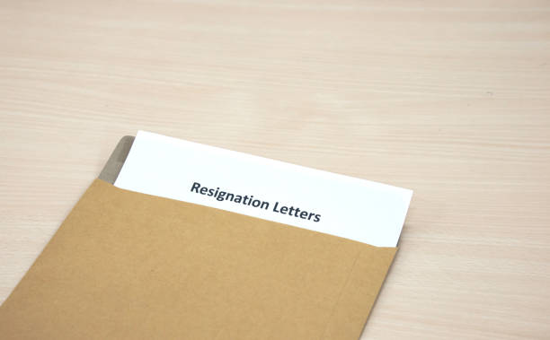 istock Resignation letter. Resignation letter in brown envelope. 1403184272