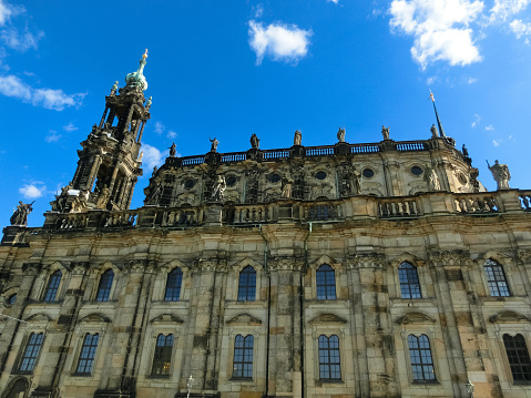 Dresden, Germany - April 18, 2022: Cathedral (Katholische Hofkirche) on Theaterplatz square.