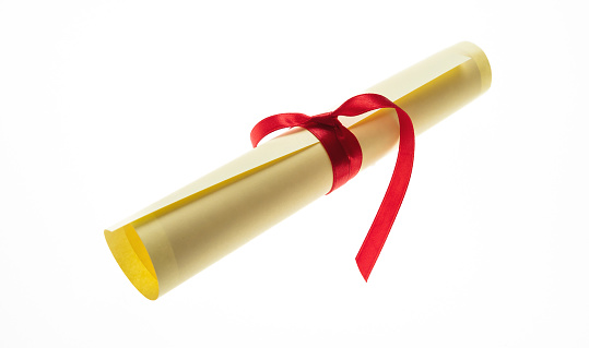 Diploma, paper scroll with red ribbon isolated on white background, 3d rendering. Computer digital drawing.